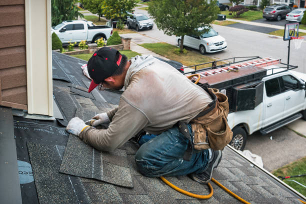 Professional Roofing technician working in Laura, OH